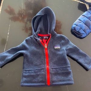 Patagonia jacket navy blue 3-6 mo. Some light pilling but o/w GUC